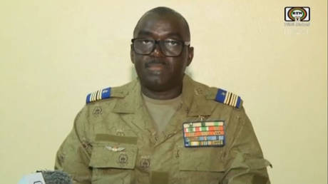 Colonel Major Amadou Abdramane reading a statement on national television on July 31, 2023.