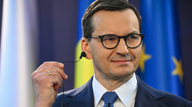 Polish PM taunts EU over migration with French unrest video