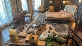 Guns, wigs, gold: Images from Prigozhin’s ‘mansion’ published