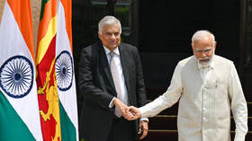 Debt-ridden Sri Lanka seals key deals with India