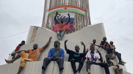 Supporters of the Nigerien defence and security forces rally outside the national assembly in Niamey on July 27, 2023