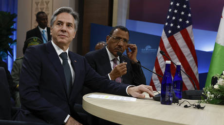 FILE PHOTO: US Secretary of State Antony Blinken looks on next to Niger's President Mohamed Bazoum during the US Africa Leaders Summit 2022, December 13, 2022