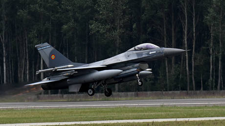A Romanian Air Force F-16 jetfighter takes off from the tarmac of Siauliai airbase in Lithuania during the NATO exercise, on July 4, 2023.