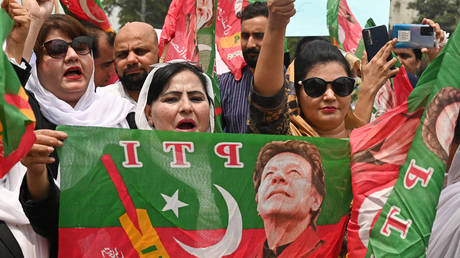 Supporters of Pakistan's former Prime Minister Imran Khan rally outside the High court in Lahore on August 7, 2023