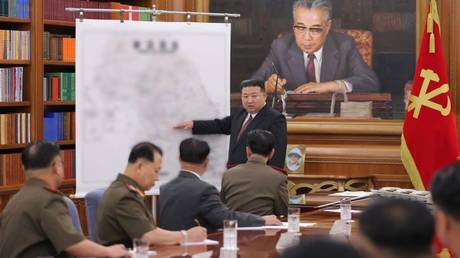 North Korean leader Kim Jong-un points to a map during a meeting of the Central Military Commission this week in Pyongyang.