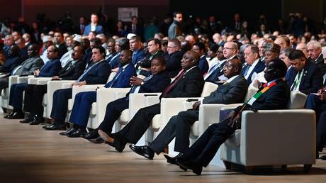 Participants, including Uganda's President Yoweri Museveni, second from right, attend a plenary session of the Russia-Africa Summit and Economic and Humanitarian Forum in St. Petersburg, Russia, Thursday, July 27, 2023.