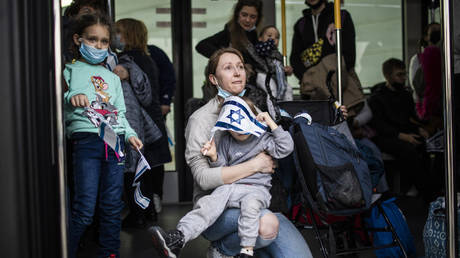 FILE PHOTO: Jewish Ukrainians are shown arriving at Israel's Ben Gurion International Airport.