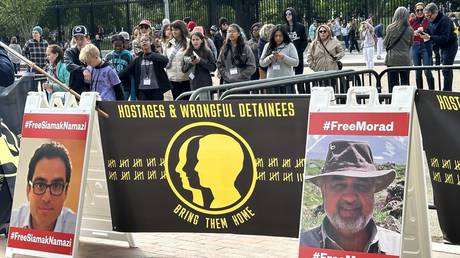 Family members and other protestors rally outside the White House in May to push for the release of US citizens imprisoned in Iran, including Siamak Namazi and Morad Tahbaz.