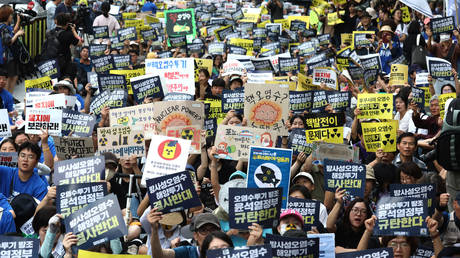 South Koreans rally against Japan's plan to dump radioactive wastewater from the Fukushima power plant into the Pacific Ocean, on August 12, 2023.