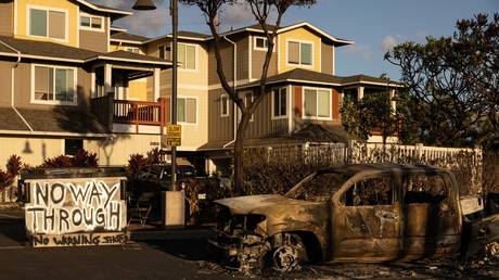 File photo: A car destroyed by fire outside an apartment complex in Lahaina, Maui, Hawaii on August 12, 2023.