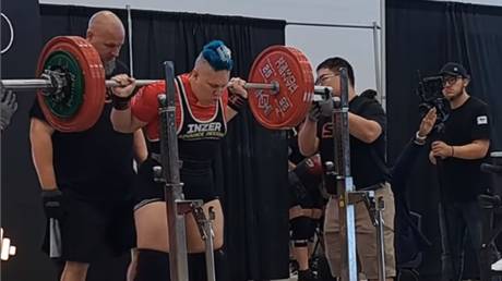 Transgender powerlifter Anne Andres performs a squat at the Canadian Powerlifting Union’s 2023 Western Canadian Championship in Manitoba, Canada, August 13, 2023.