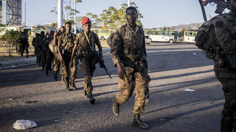 FILE PHOTO: Soldiers from the Ethiopian National Defence Force (ENDF) walk in the streets of Kombolcha, Ethiopia.