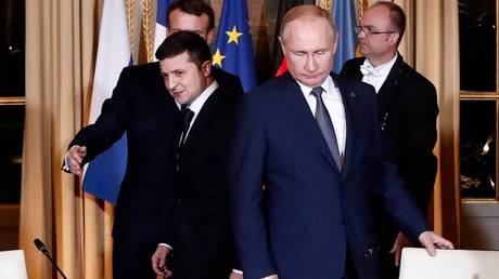 Ukrainian President Vladimir Zelensky and Russian President Vladimir Putin attend a meeting on Ukraine at the Elysee Palace in Paris, France, December 9, 2019
