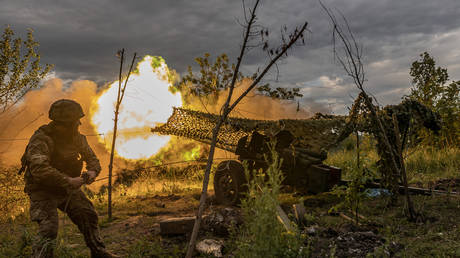 FILE PHOTO: Ukrainian soldier firing artillery.