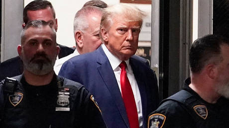 Trump’s mugshot released after his surrender at Atlanta jail