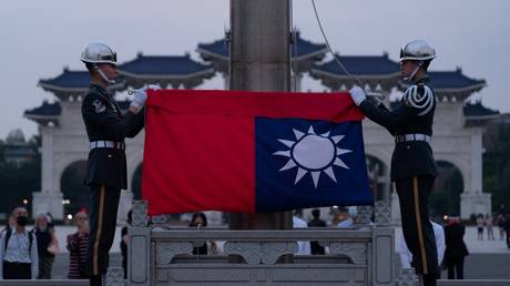 FILE PHOTO: Soldiers at a flag-lowering ceremony in Taipei, on April 13, 2023.