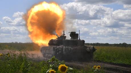 A Russian T-90 M "Proryv" tank fires at Ukrainin positions in Russia's Lugansk People's Republic.