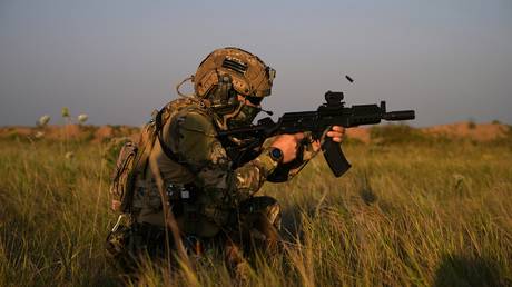 FILE PHOTO: A Russian serviceman from a fire support unit takes part in a tactical and medical training in the course of Russia's military operation in Ukraine.