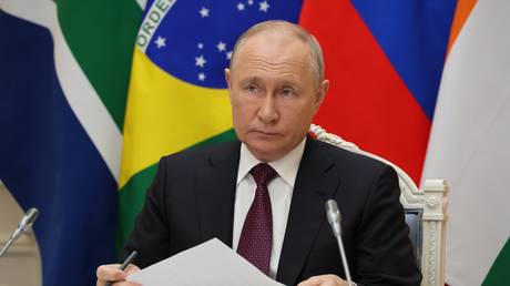 Russian President Vladimir Putin takes part in a news conference during the 15th BRICS Summit via videoconference in Moscow, Russia.