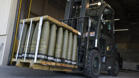 FILE PHOTO: US Airmen use a forklift to move 155 mm shells ultimately bound for Ukraine at Dover Air Force Base, Delaware, April 29, 2022