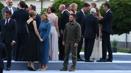 FILE PHOTO: Ukrainian President Vladimir Zelensky attends a NATO summit in Lithuania with his wife