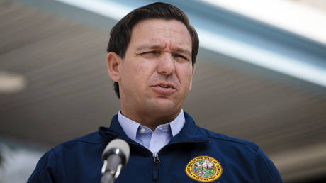 DeSantis jeered at shooting vigil