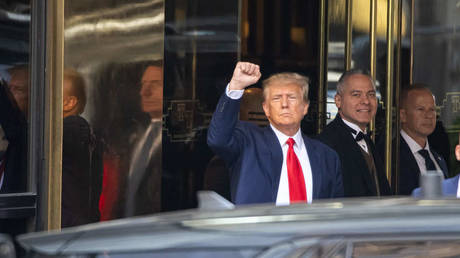 FILE PHOTO: Former US President Donald Trump exits Trump Tower to attend court for his arraignment on April 04, 2023 in New York City.