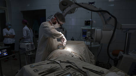 FILE PHOTO: Doctors operate in a Military Hospital in Kiev District.