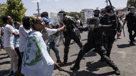 Israeli police clash with Eritrean migrants as a riot breaks out over a festival at the African country's embassy in Tel Aviv on Saturday.