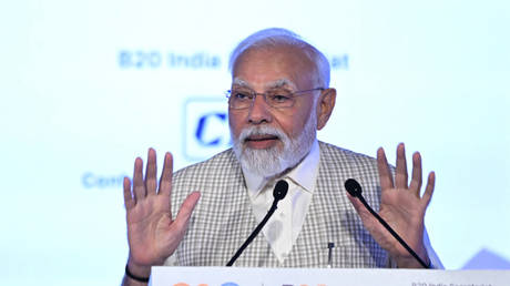 India's Prime Minister Narendra Modi addresses the gathering on the third day of the three-day B20 Summit in New Delhi on August 27, 2023