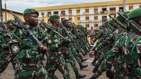 Members of the Republican Guard take part in the military parade in honour of General Brice Oligui Nguema (unseen), inaugurated as Gabon's interim President, in Libreville on September 4, 2023.