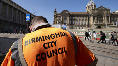 Birmingham City Council refuse collector works emptying the bins opposite the Town Hall building in Victoria Square on 5th September 2023 in Birmingham, United Kingdom