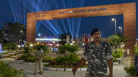 A security officer stands guard near the main venue for the G20 summit in New Delhi, India, Thursday, Sept. 7, 2023.