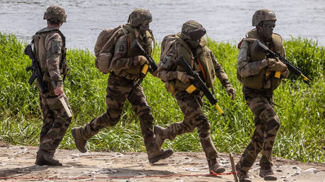 Soldiers are seen as troops from Poland, USA, France and Sweden take part in the DEFENDER-Europe 22 military exercise, in Nowogrod, Poland on May 19, 2022.