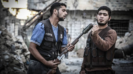 FILE PHOTO: Fighters from the Army of Islam in Syria, June 22, 2015