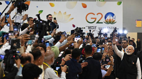 Prime Minister Narendra Modi greets the media at the G20 summit, New Delhi, India, September 10, 2023.