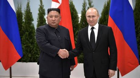 FILE PHOTO: Russian and North Korean leaders Vladimir Putin and Kim Jong-un pose together during an April 2019 meeting in Vladivostok.