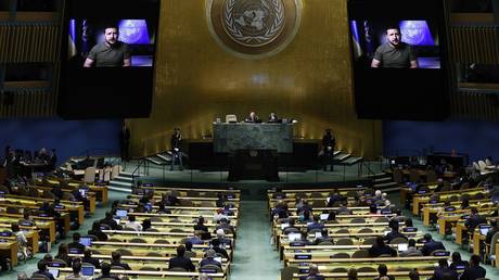 FILE PHOTO: Delegates listen to a pre-recorded speech by Ukrainian President Vladimir Zelensky during a UN General Assembly session