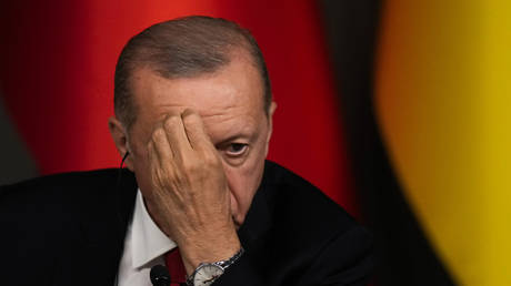 Recep Tayyip Erdogan listens during a joint news conference following in Istanbul, Türkiye, July 8, 2023