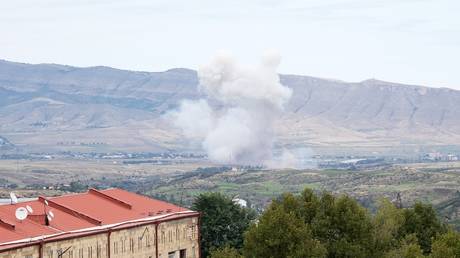 Smoke rises near Stepanakert in the Azerbaijani breakaway region of Nagorno-Karabakh on September 19, 2023.