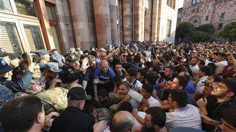 People gather at the Armenian government building to protest against Prime Minister Nikol Pashinyan in Yerevan, Armenia, September 19, 2023
