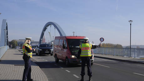 German Federal Police stop a van to search for immigrants at the border crossing from Poland into Germany in Frankfurt an der Oder, Germany, October 28, 2021