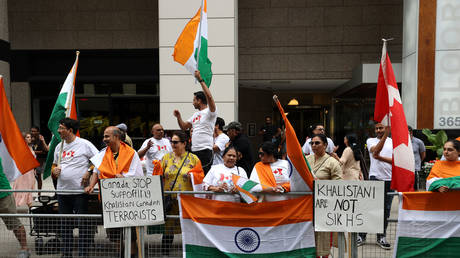 Pro-India counter protestors counter pro-Khalistan supporters at a demonstration in front of the Indian Consulate in Toronto, Ontario, Canada on July 8, 2023.