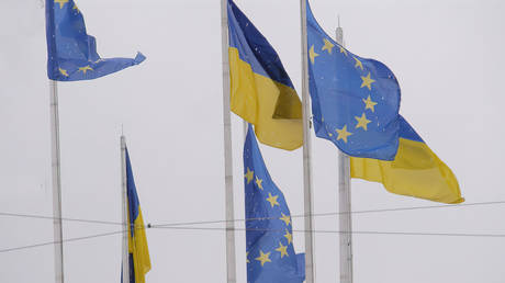 View of Ukrainian and European Union flags on a series of flagpoles near Maidan Nezalezhnosti, Kiev, Ukraine, March 30 or 31, 2014