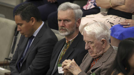 Yaroslav Hunka (R) waits for the arrival of Ukrainian President Vladimir Zelensky in the House of Commons in Ottawa, Canada, September 22, 2023