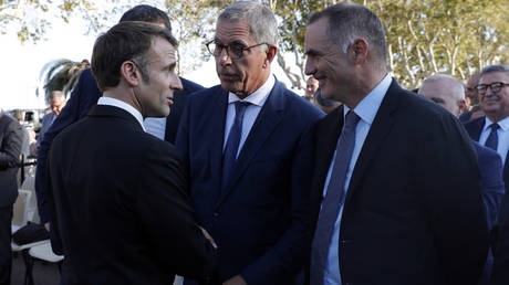 Macron backs limited autonomy for restless French island