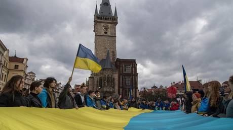 Demonstrators, mainly Ukrainian refugees, taking part in a rally Prague, Czech Republic.
