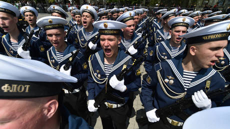 FILE PHOTO. Russian Navy sailors march during the military parade marking the 240th anniversary of the Black Sea fleet, in Sevastopol, Crimea, Russia.
