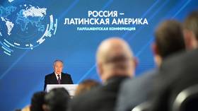 Putin calls for global economic change