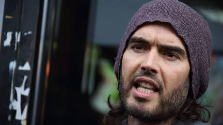 Russell Brand opens the Trew Era Cafe on March 26, 2015 in London, England